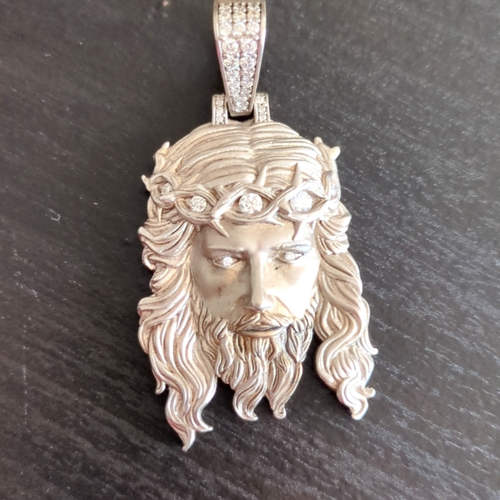 Jesus piece! 925 sliver with solid back moissanite diamond in the crown and eyes